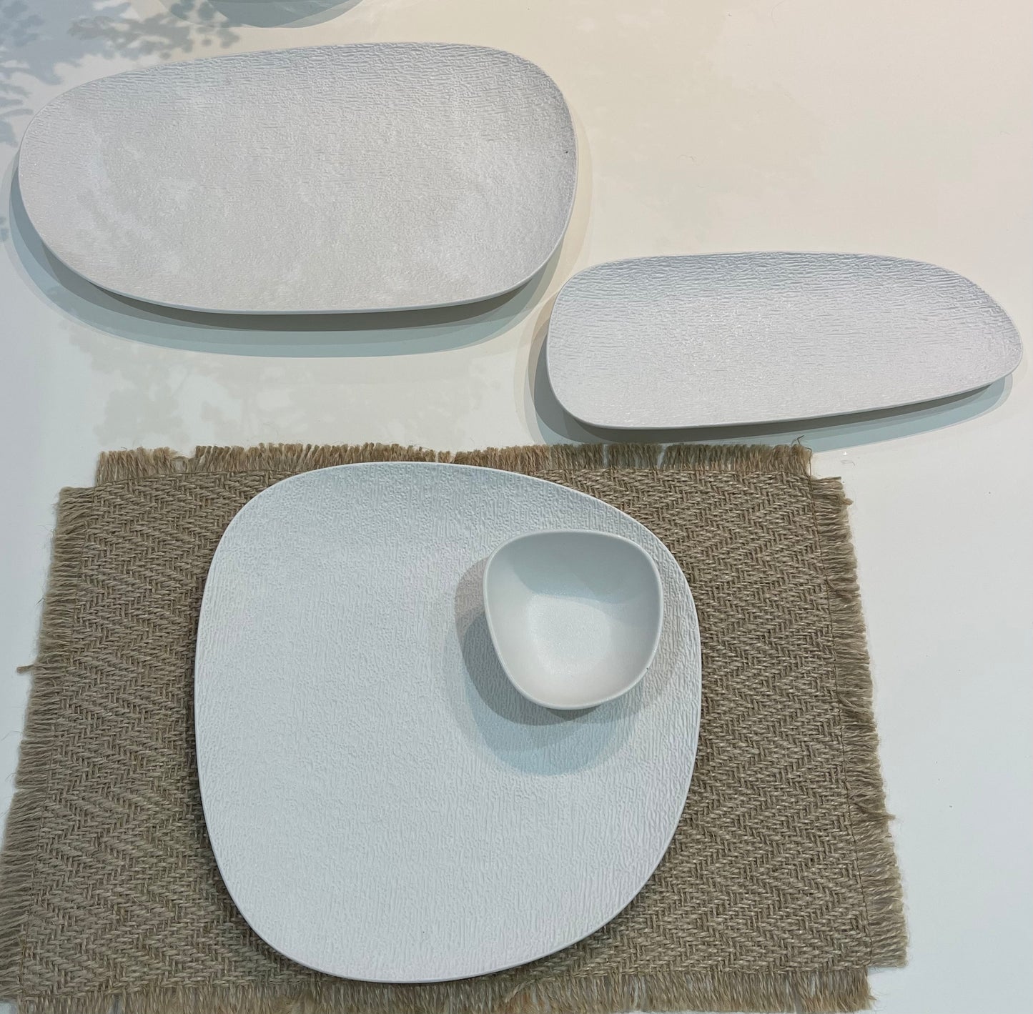 Stone asymmetrical serving bowl