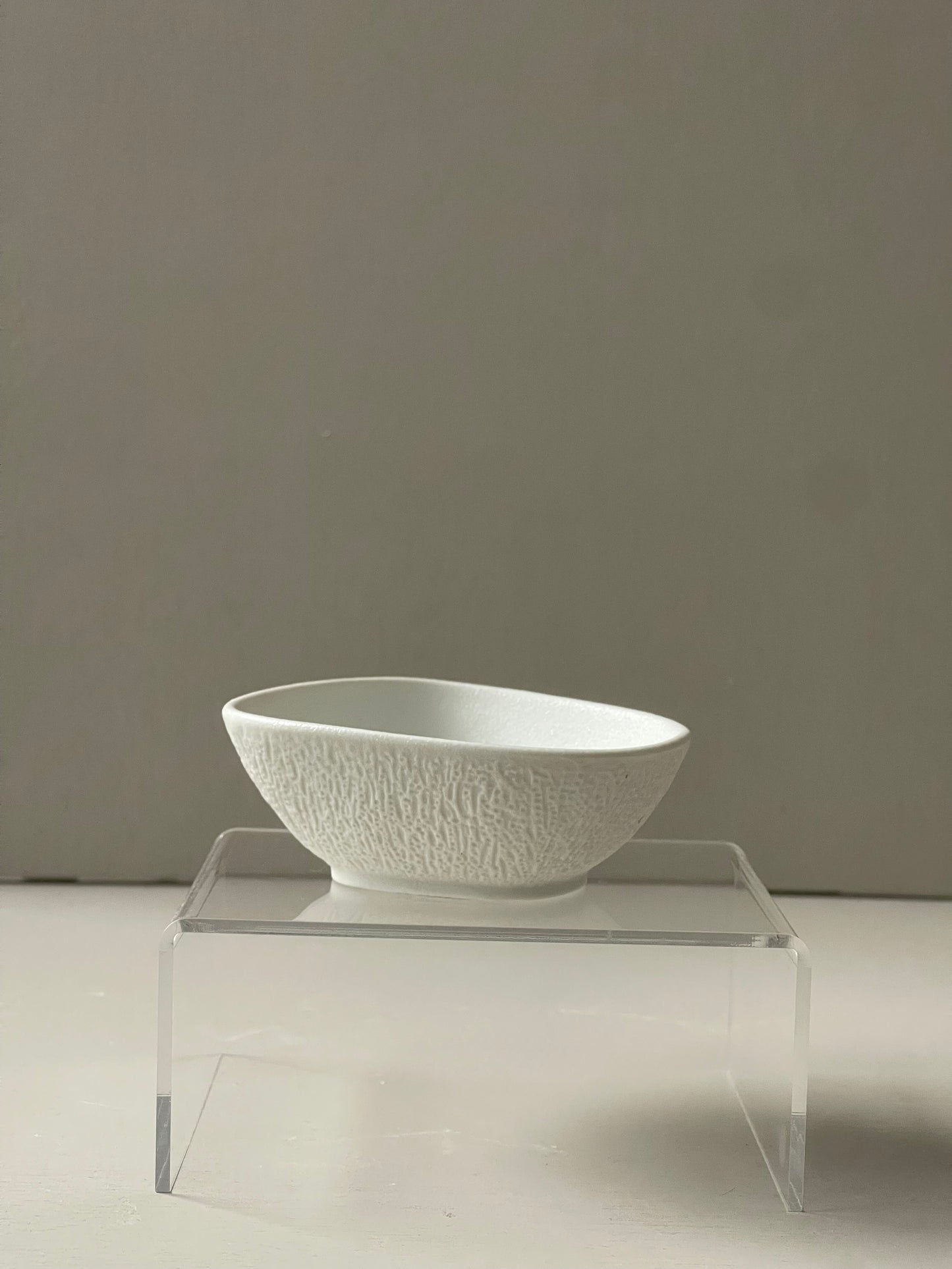 Stone asymmetrical serving bowl